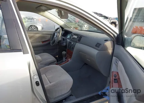 2003 Toyota Corolla Le z USA, uszkodzony, nr VIN 2T1BR38E23C109778